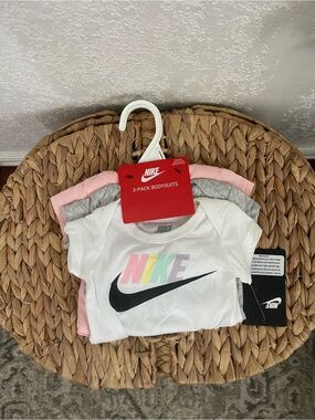 Nike Kids 3-Pack Bodysuits in White, Pink, Gray